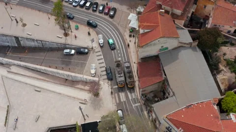 Tram Driving Through Historic City Streets View from Above 库存影片 330747853