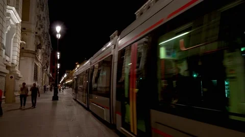 Tram driving through the old town center of Seville Stock Footage 159174396