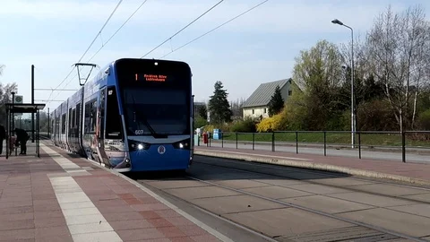 A Tram goes through the city Stock Footage 105894836