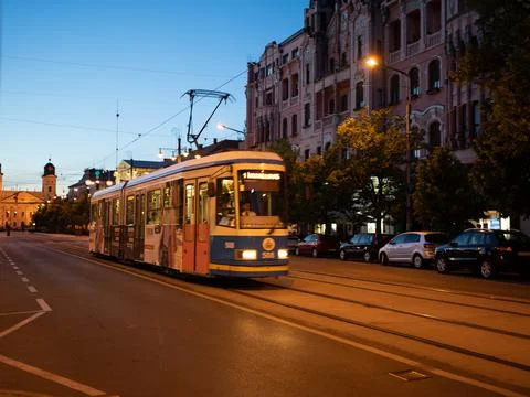 Tram going down the tracks Stock Photos