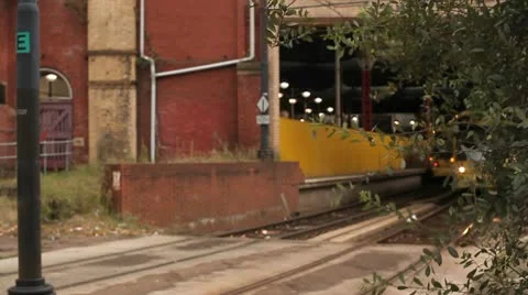 Tram Leaving Station HD File Stock Footage 10686124
