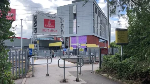 Tram line crossing at the Old Trafford C... | Stock Video | Pond5