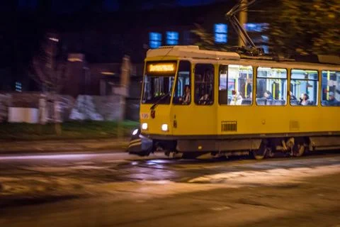 Tram in motion at night Stock Photos