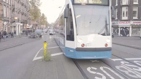 Tram moving through Amsterdam Stock Footage 137309215