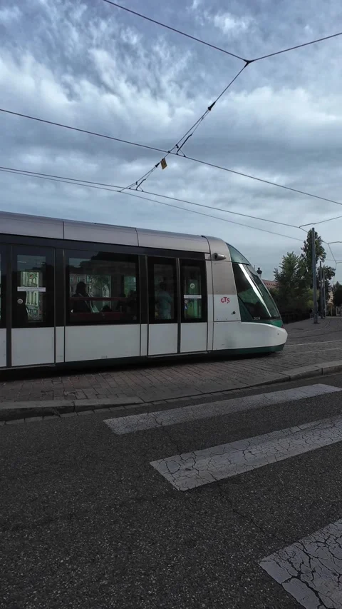 Tram Moving Through Strasbourg City Center on a Sunny Day Stock Footage 344822330