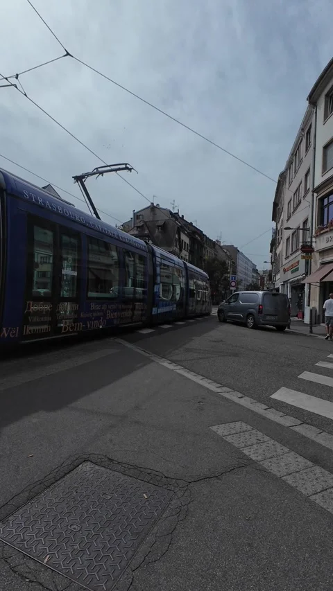 Tram Moving Through Strasbourg City Center on a Sunny Day Stock Footage 344822370
