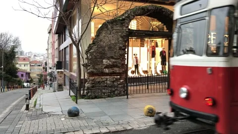 Tram pass in front of the historical gate Stock Footage 145222390