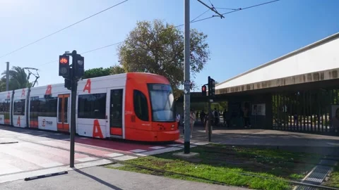 The tram passing in front of the main entrance to the Alicante University. Stock Footage 301706110