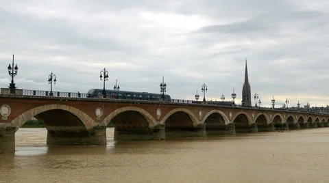 Tram passing over the Pont de Pierre bridge - Bordeaux France Stock Footage 41739623