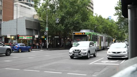 Tram passing slow-motion - Melbourne Stock Footage 232477488