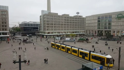Tram passing through Alexanderplatz, view from above, people walk, Germany Vídeos de archivo 76286185
