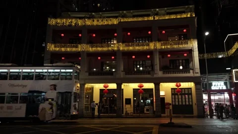 Tram passing Woo Cheong Tea House, Johnston Road, Wan Chai, Hong Kong Video stock 229989890