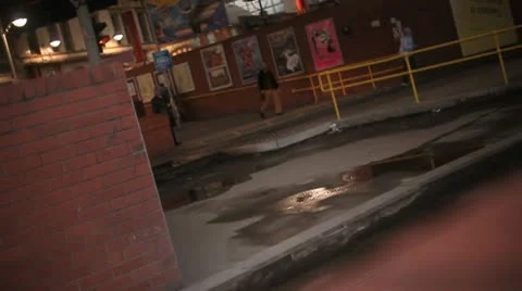 Tram pulling into wet station Stock Footage 10700428