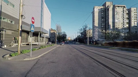 The tram quickly passes on an empty road up the street, quarantine Stock Footage 128336597