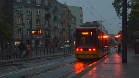 Tram on rainy day Stock Footage 147993680