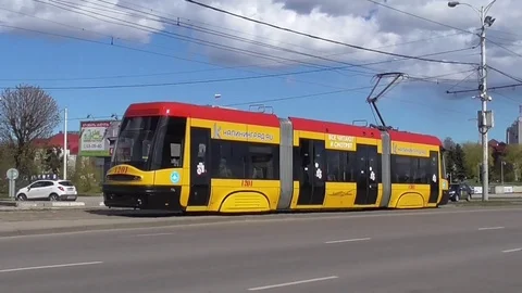 Tram rides on the street Stock Footage 74795544