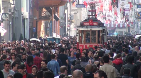 Tram rides through Istanbul shopping street, tourism, travel, crowd, busy Stock Footage