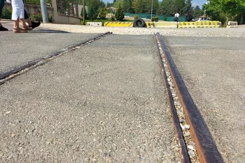 A tram road with a perspective at the end of which there is a cliff, no passa Stock Photos
