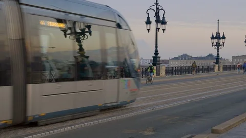 Tram rolling on rails on the Pont de Pierre bridge in Bordeaux France Stock Footage 106624129