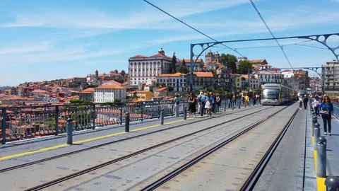 Tram running on Dom Luis I Bridge in Porto, Portugal Stock Footage 125222267