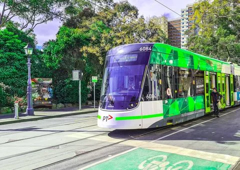 Tram stop in front of Park Stock Photos