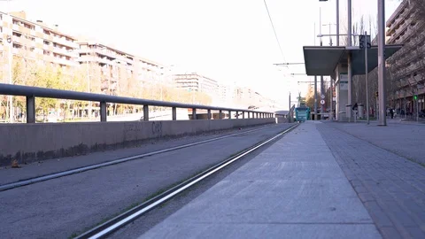 The tram stopped at a stop and dropped off passengers on a sunny day. 動画素材 123249935