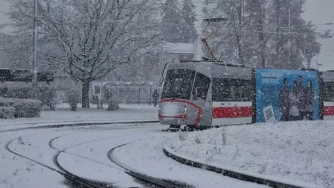 Tram terminal during snowfall Stockbeeldmateriaal 232482830