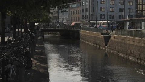 Tram Train Along Inner Moat Arriving at Drottningtorget, Gothenburg, Sweden Stock Footage 228451987