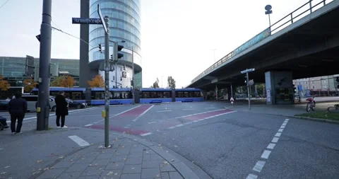 Tram Turning at Intersection – Munich Urban Traffic 4K 100fps Slow Motion - 1 Stock Footage 319300861