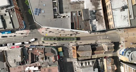 Tram waiting for get van off tracks, pedestrians walking around Vídeos de archivo 201892385