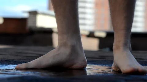 Trampled barefoot in a puddle Video stock 54410957