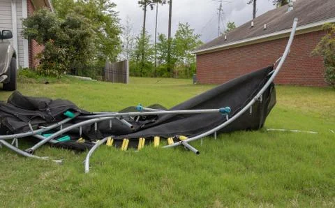 Trampoline twisted and mangled after storm. Foto stock
