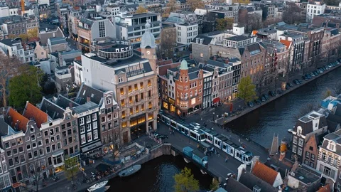 Trams on bridge in evening Amsterdam Stock Footage 118889236