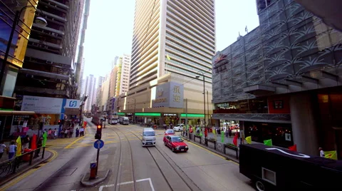 TRAMS BUSES RED TAXIS CENTRAL HONG KONG CHINA Stock Footage 67006931