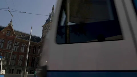 Trams in front of Amsterdam Centraal Station Stock Footage 151343328