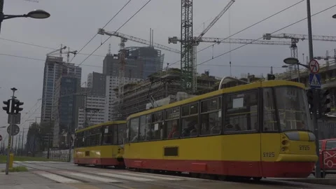 Trams going along the huge construction site Stock Footage 147626834