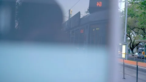 Trams leaving a stop Melbourne tram stop 스톡 동영상 97203914