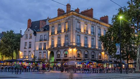 Trams Passing in the Evening at the Place Du Douffray, Nantes Stock Photos