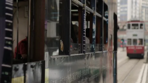 Trams passing by in Hong Kong Stock Footage