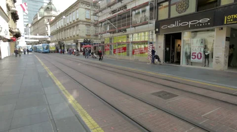 Trams passing in the pedestrian zone on Ilica street, Zagreb Stock Footage 37323027