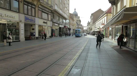 Trams passing in the pedestrian zone on Ilica street, Zagreb Stock Footage 37335155