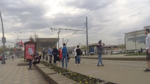 Trams At Stop and people On Summer Day Timelapse Stock Footage 77285232