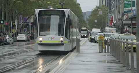 Trams on the street Stock Footage 76515356