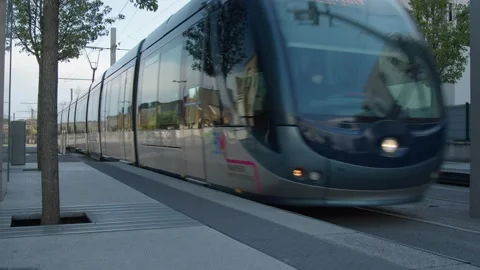 Tramway arriving in station. Video stock 187092776