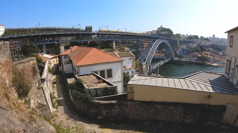 TRAMWAY PASSING IN LUIS I BRIDGE FROM PORTO, PORTUGAL Stock Footage 95093903
