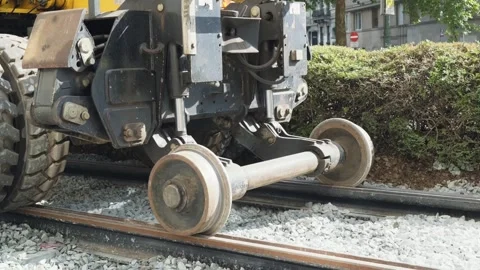 Tramway rail construction and maintenance machinery working on tracks in Stock Footage 344332174