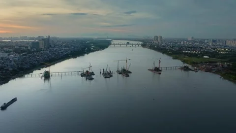 Tran Hung Dao Bridge Construction on Red River, Hanoi at Sunset Stock Footage 337786328