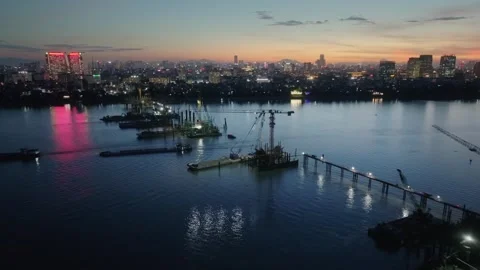 Tran Hung Dao Bridge Construction on Red River, Hanoi at Dusk Stock Footage 337787252
