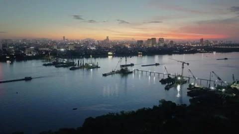 Tran Hung Dao Bridge Construction on Red River, Hanoi at Dusk Stock Footage 337787292