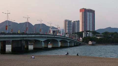 Tran Phu bridge over Cai river in Nha Trang at evening, Vietnam Video stock 336565201